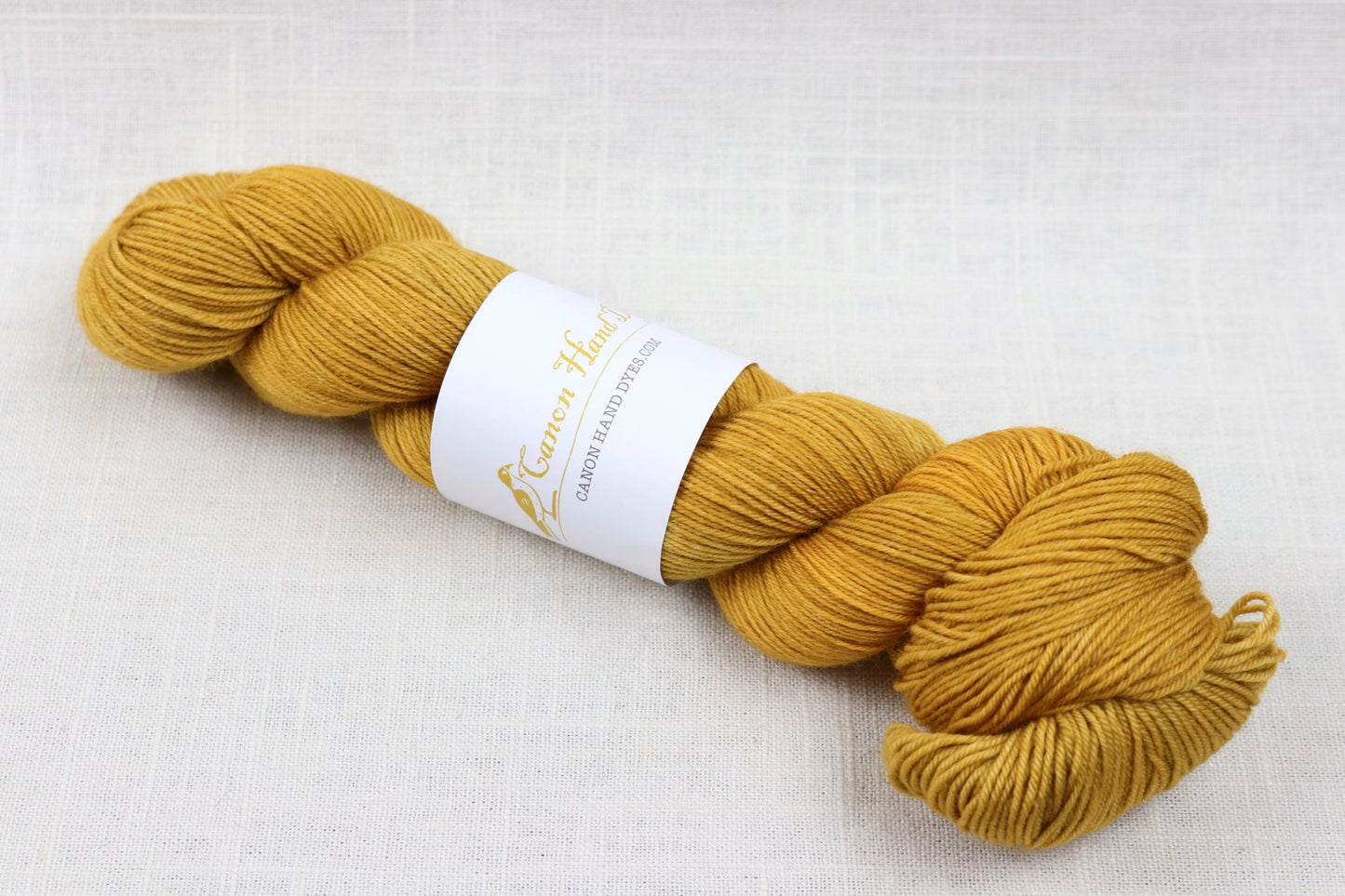 canon hand dyes john merino fingering goldenrod